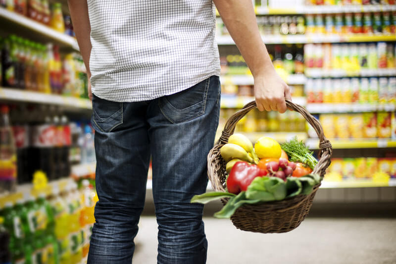 Man Shopping for Healthy Salt in a Grocery Store | Boulder Salt Company