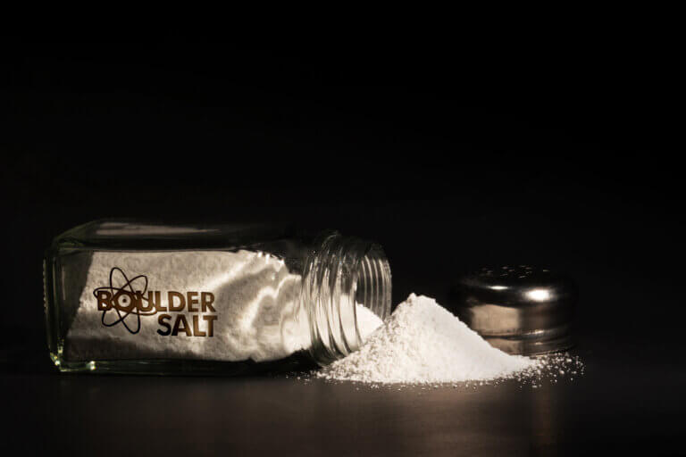 Boulder Salt in a glass shaker that's tipped over