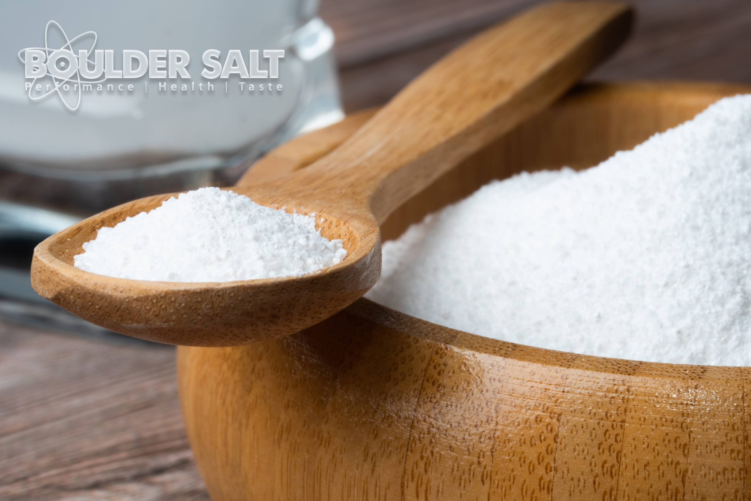 A wooden bowl, full of Boulder Salt, so that it is easy to use in the kitchen or at the dinner table.