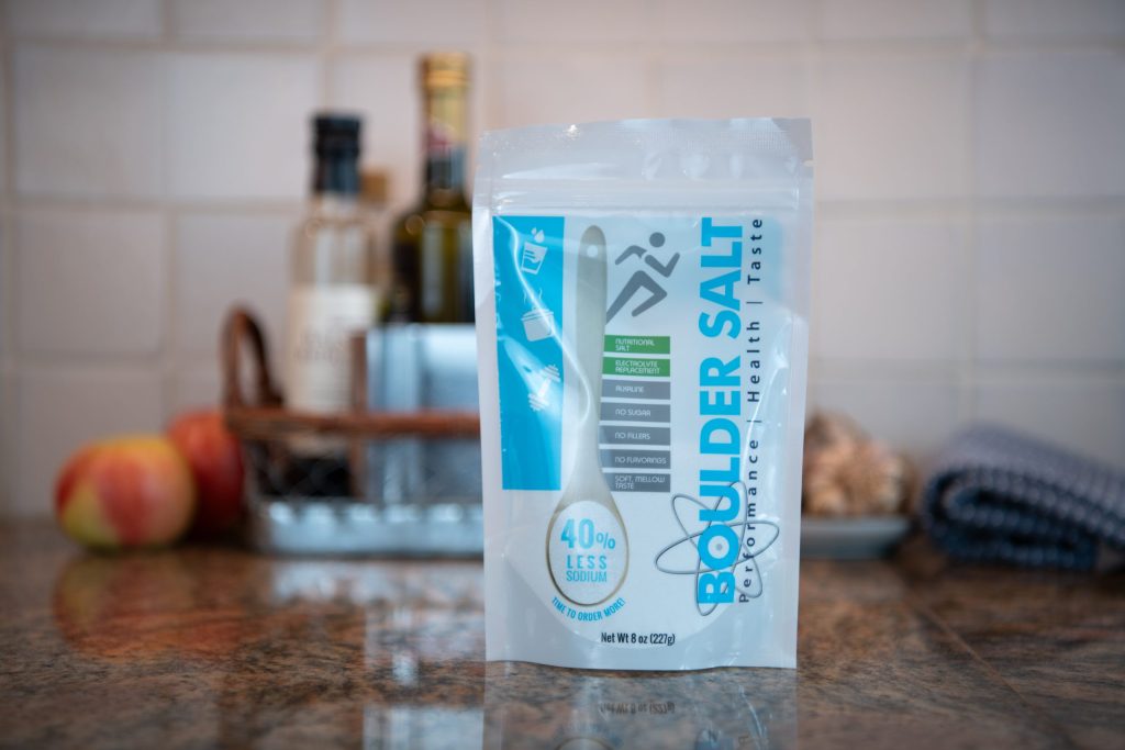 Boulder Salt 8oz resealable bag on a kitchen counter - a heart-healthy Multi-Salt for hydration and seasoning.